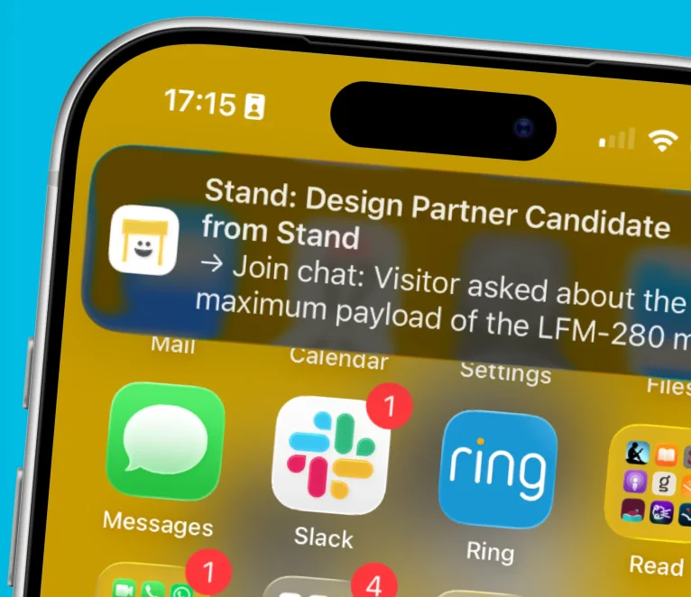 A phone notification from Stand for a label-matched visitor conversation worth joining.